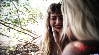 Lesbian passion by the waterfall