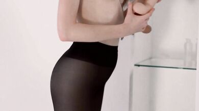 Lesbians play with nylon and fuck with a strapon