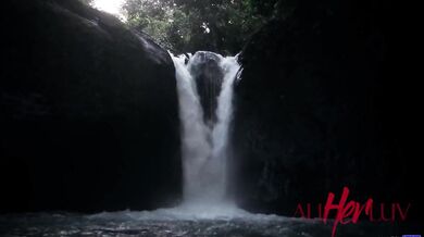 Lesbian passion by the waterfall