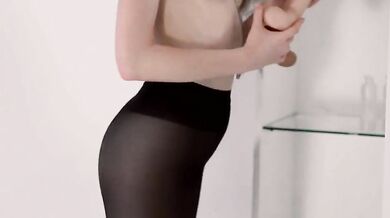 Lesbians play with nylon and fuck with a strapon