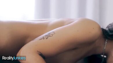 REALITY JUNKIES - Hot brunette teases with her mouth before giving in to deep intimate sex in bed